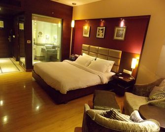 Lords Plaza Surat - Surat - Schlafzimmer