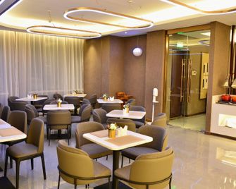 Home Inn Plus Lianyungang Donghai Pedestrian Street High Speed Rail Station - Lianyungang - Restaurant