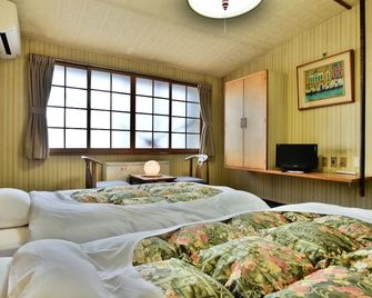 Guest House Takenoya - Ōmachi - Makuuhuone