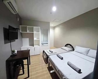 2020 Travelers Inn - Dumaguete City - Schlafzimmer