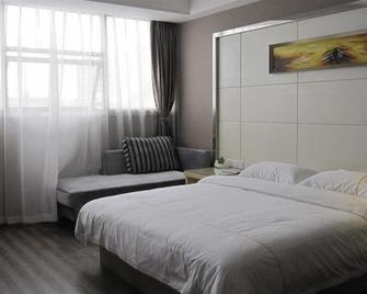 Sheng Jing Yi Jia Hotel - Xiangyang - Habitación