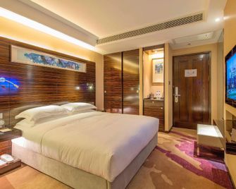 Yatai Longda Hotel - צ'נגצ'ון - חדר שינה