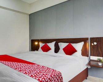 Hotel O Ambience Residency - Пуна - Спальня