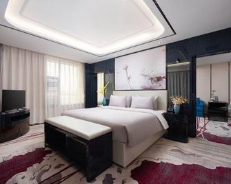Mengzi Hetai Hotel (Nanhu Park) - Honghe - Bedroom