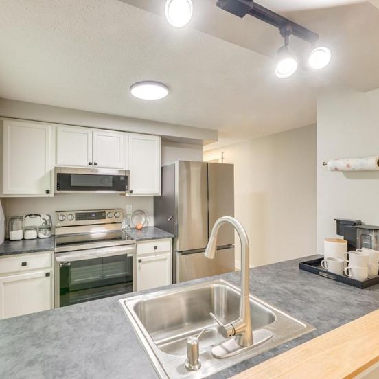 Kitchen view of Greenbrier River Retreat with Deck - Steps to Trail!