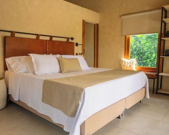 Tierra Mistú - Ginebra - Habitación
