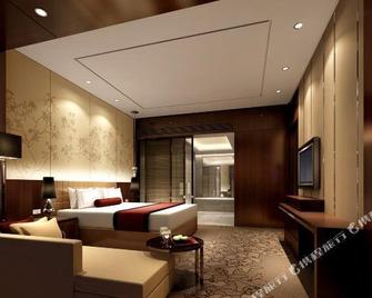 Jitang New Century Hotel - Tangshan - Habitación