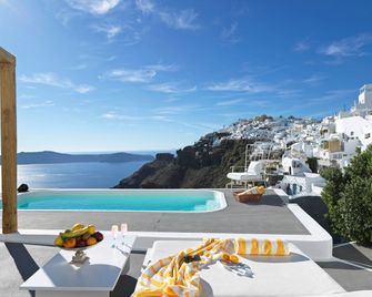 Katikies Chromata Santorini - The Leading Hotels of the World - אימרוויגלי - חדר שינה