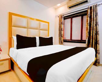 Hotel O Andheri West Near Kokilaben Hospital - Mumbai - Bedroom