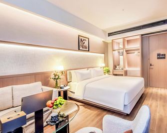 Yashihui Hotel - Hami - Habitación