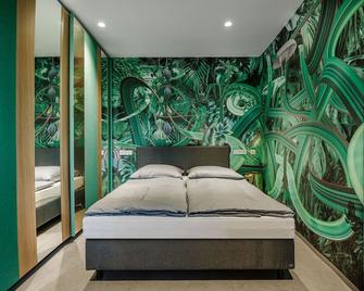 Brucklyn Suites - Erlangen - Sypialnia