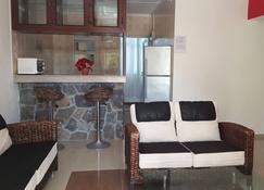 Coral Apartments defines true Mauritian Hospitality. Comfy Two Bedroom Apartment - Grand Gaube - Salon