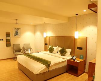 Hotel Reva Regency - Bhopal - Bedroom