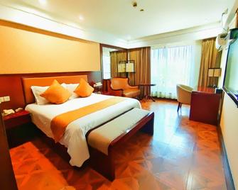 Linjiang International Cruise Hotel (Shanghai Youyi Road) - Shanghai - Schlafzimmer