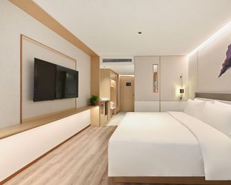 Tianjin Elong Hotel - Tianjín - Habitación