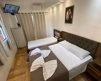 Pousada Ninho da Coruja - אראיאל דו קאבו - חדר שינה