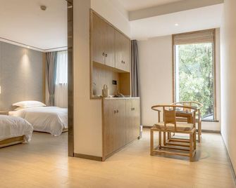 Manting · M Meishu Resort Hotel (Zhangjiajie National Forest Park Wulingyuan Branch) - Zhangjiajie - Schlafzimmer