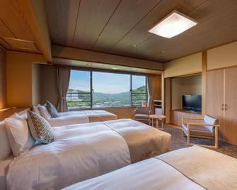 Kamenoi Hotel Toba - Toba - Habitación