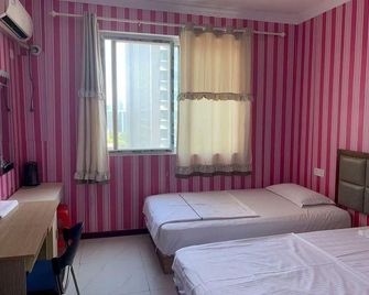 Taining Apartment - Wuhan - Chambre