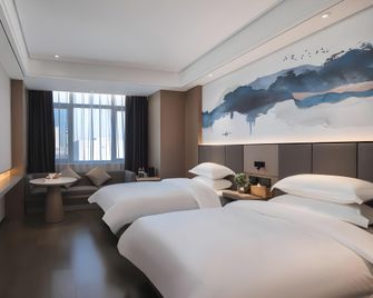 Greentree Eastern Hotel Chuzhou Suchu Industrial Park - Chuzhou - Bedroom