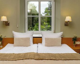 سكن ميبر - فيلنيوس - غرفة نوم