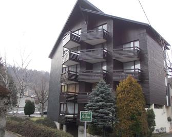 Appartement les Domes - Mont-Dore - Edificio