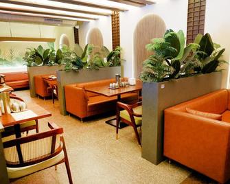 Green Grande Inn - Madrás - Restaurante