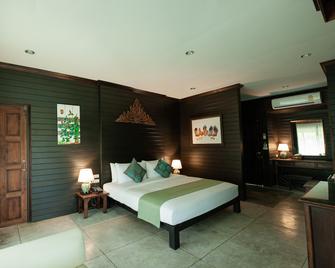 Royal River Kwai Resort and Spa - קאנצ'אנאבורי - חדר שינה