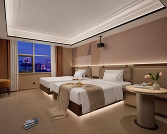 South Bay International Hotel - Yunfu - Bedroom