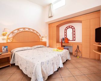 TH Marina di Sibari - Baia Degli Achei Village - Cassano all'Ionio - Schlafzimmer