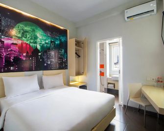 Cleo Hotel Jemursari Surabaya - סוראבאיה - חדר שינה