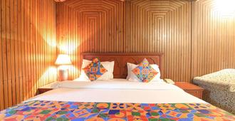 Mohan Hotel - Lucknow - Bedroom