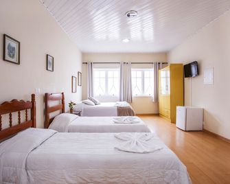 Grand Residences Pousadas - Campos do Jordao - Schlafzimmer