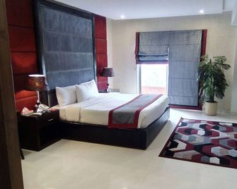 Maisonette Hotels & Resorts Lahore - Lahore - Phòng ngủ