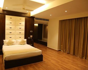 Hotel Eefa - Belgaum - Schlafzimmer