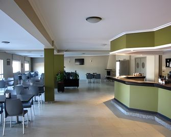 杜爾明蒙塔沃海灘飯店 - 波多諾伏 - 餐廳