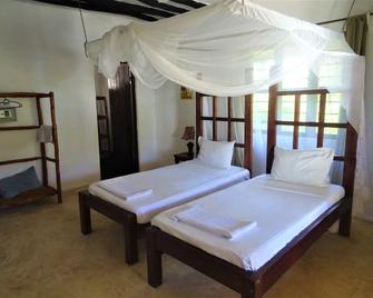 Makuti Beach Bungalows - Bwejuu - Schlafzimmer