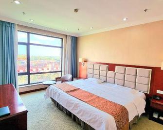 Huludao International Hotel (Longwan Seaside Branch) - Huludao - Bedroom