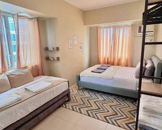 Spacious lodge in terrific Mandaue City with AC, WiFi - Thành phố Mandaue - Phòng ngủ