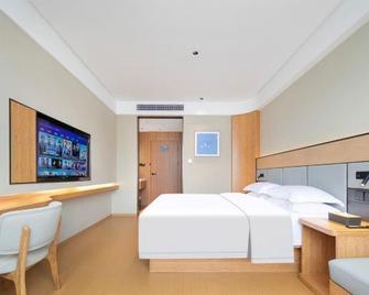 Qingxin Hotel - Enshi - Habitación