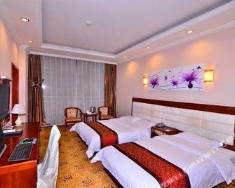 Longhua Hotel - Baotou - Bedroom
