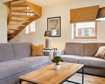 Dormio Resort Obertraun - Obertraun - Wohnzimmer