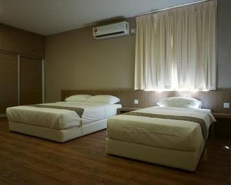 Yew Hotel - Miri - Schlafzimmer