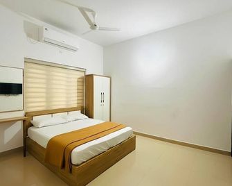 Easy Nest Residency - Cananor - Quarto
