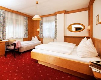 Hotel Grafenwirt - וואגריין - חדר שינה