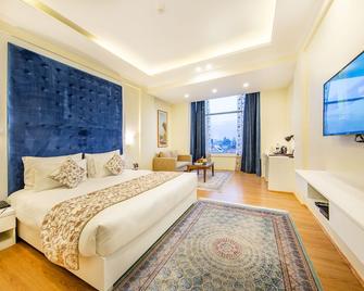 Arco Hotels And Resorts Srinagar - סרינגאר - חדר שינה