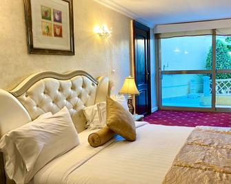 Paradise Inn Beach Resort - Alexandria - Bedroom