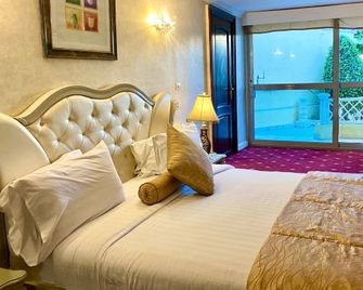 Paradise Inn Beach Resort - Alexandria - Bedroom