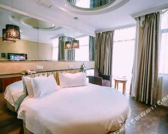 Qingmu Hotel (Maanshan West Yushan Road) - Ma'anshan - Slaapkamer