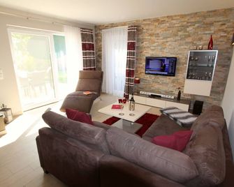 Ferienhaus Lounge House - Goehren-Lebbin - Huiskamer